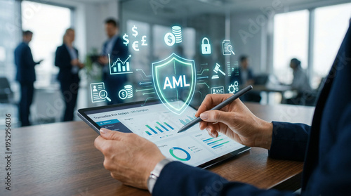 Digital concept of AML compliance and anti-money laundering security displayed with financial icons, shield, bank, legal symbols over tablet. show risk management, regulatory control, fraud prevention