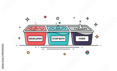 Chemical trays in darkroom three small labeled trays arranged side by side with subtle ripple details, representing developer, stop bath and fixer stages of