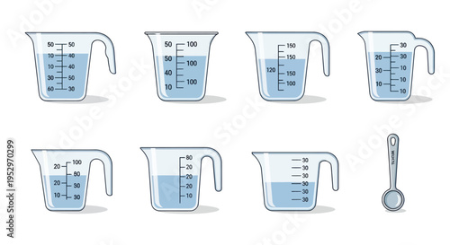Measuring Cups with Liquid: A Collection of Kitchen Tools for Cooking and Baking.