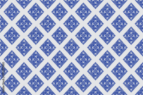 Elegant blue and white seamless geometric pattern featuring ornamental floral motifs arranged in diamond shapes. Decorative vintage-inspired tile design with a clean, modern touch.