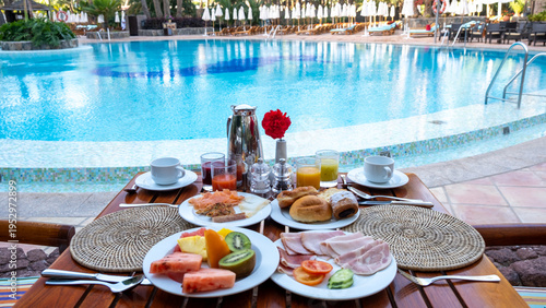 Canvas Print Indulge in a luxury breakfast by the serene poolside in Gran Canaria, Spain