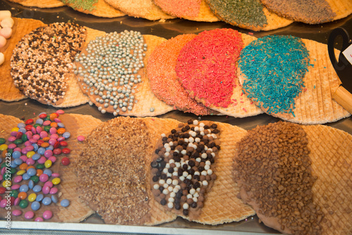 Assorted waffles with multicolored toppings