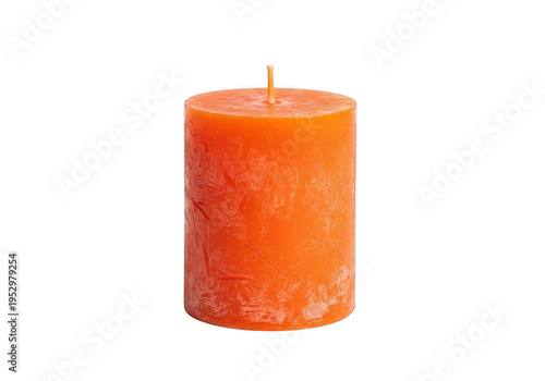 A cylindrical orange candle with a wick on top