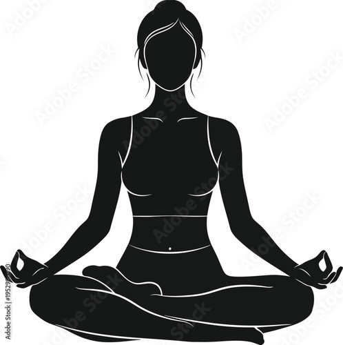 Silhouette of a woman meditating in a lotus yoga pose showing calm and relaxation