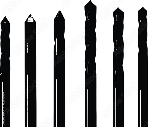 A set of five black pointed drill bits on a white background