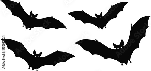 Four black bat silhouettes flying on a white background