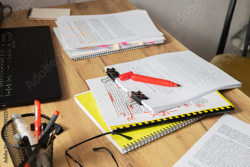 Photography Editing paperwork with highlighted text and notes showing revision and proofread