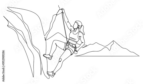 A woman rock climbing on a mountain with a rope and harness