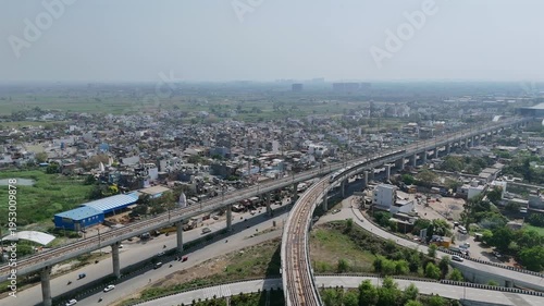 Aerial 4k view of RRTS Namo Bharat Train Running in Meerut, Uttar Pradesh, India