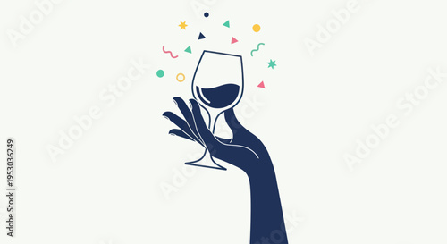 Hand holding wine glass celebration.