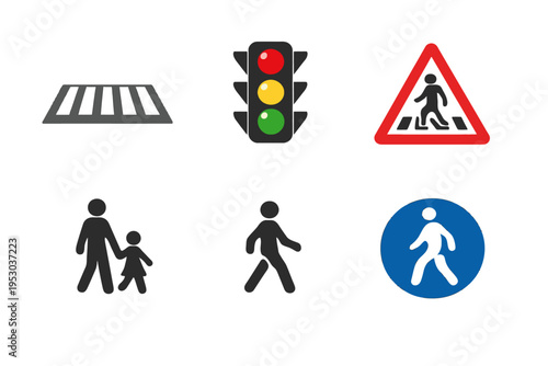 Pedestrians crossing road with traffic light signals and warning signs