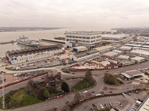 Birkenhead, Merseyside - 03102026: Aerial view of ship repair yard with dense surrounding industrial buildings