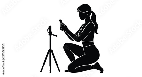 Black silhouette of woman recording video with smartphone on tripod