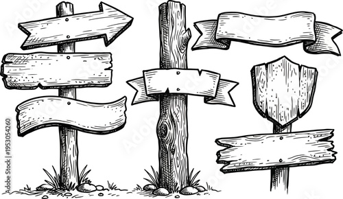 Rustic wooden signs on posts with blank banners for directions