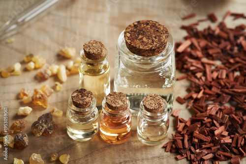 Aromatherapy essential oils with frankincense resin and red sandalwood chips