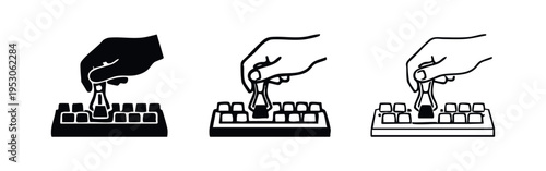 Hand using a keycap puller to remove a mechanical keyboard keycap icon set for maintenance and customization.