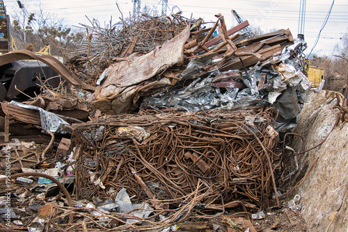 Steel waste from rebar close-up, scrap steel and other metal waste, preparation for recycling