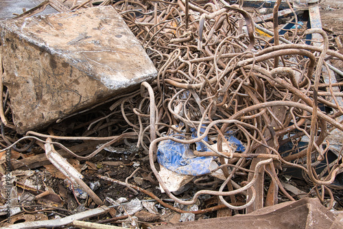 Steel waste from rebar close-up, scrap steel and other metal waste, preparation for recycling