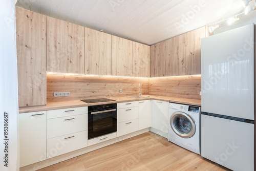 Принти на полотні Modern Home Kitchen Interior with Wooden Cabinets and Contemporary Appliances