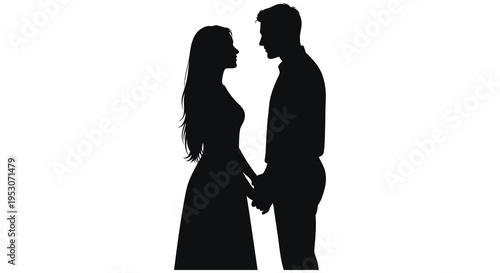 Silhouette of a romantic couple holding hands in love