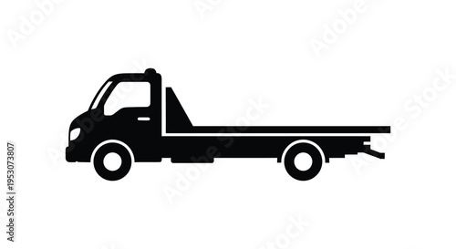 Silhouette of a flatbed tow truck on a white background