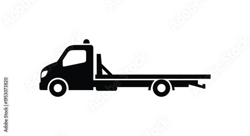Silhouette of a flatbed tow truck vehicle in black