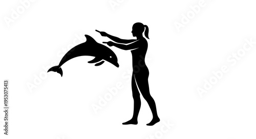 Woman silhouette training jumping dolphin