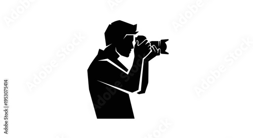 Silhouette of a photographer taking a picture with a professional camera