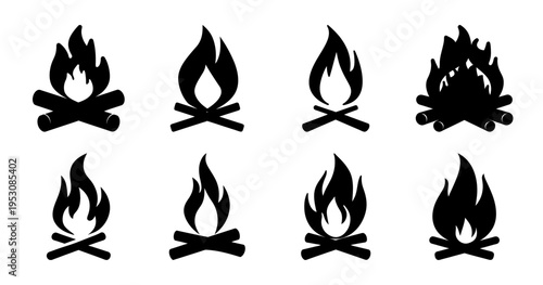 A collection of black campfire icons with varied flame designs for camping