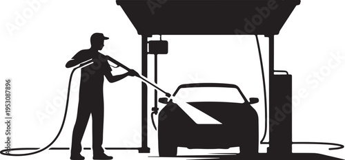 Black silhouette of man washing car at automatic car wash