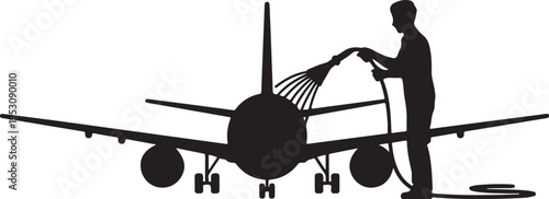 Man washing airplane with hose cleaning