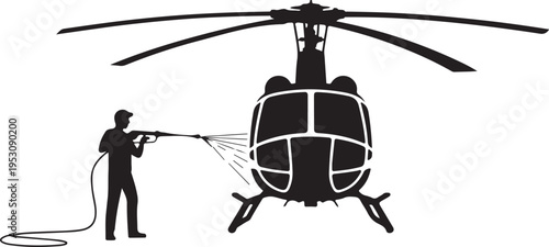 Man washing helicopter with pressure washer cleaning 1