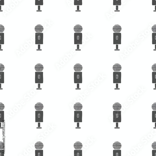 Repeating pattern of dark gray vintage microphones on white background