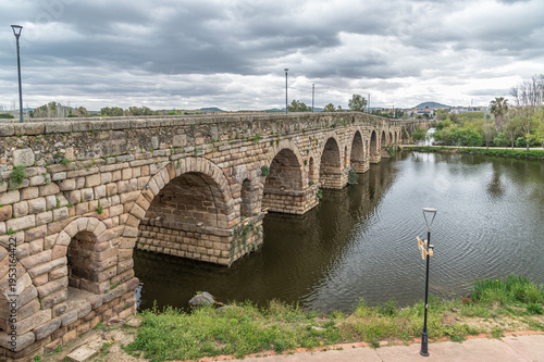 Ancient Roman arch bridge over Guadiana River in Merida, Spain