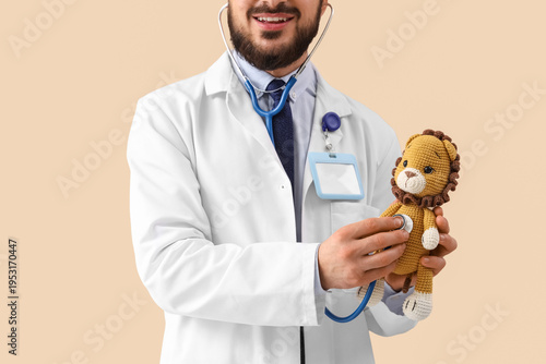 Male pediatrician with stet...