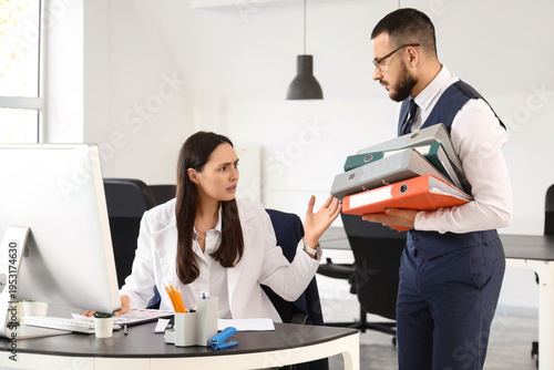 Angry female boss and male ...
