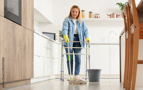 Mature woman with walker mo...