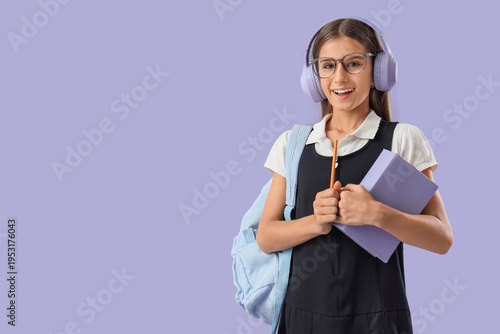 Teenage schoolgirl in headp...