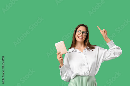 Young woman with notebook p...