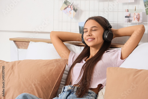Teenage girl with headphone...