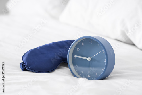 Alarm clock and sleeping ma...
