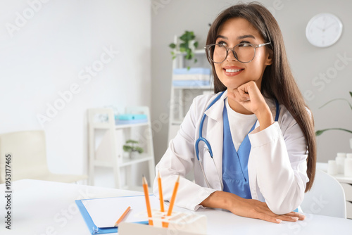 Dreaming female doctor at d...