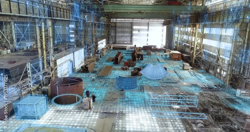 Industrial interior. A large shipyard or steel structure factory from the inside. Huge workshop for assembling steel structures and steel bridges.