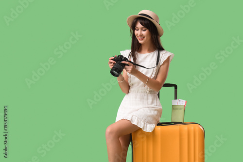 Female tourist with photo c...