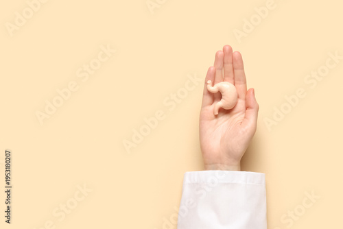 Female doctor's hand with h...