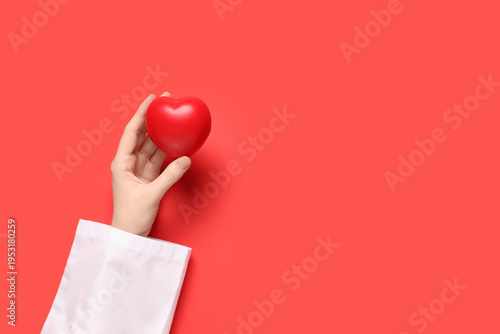 Female doctor's hand with h...