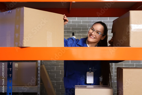 Female worker behind shelf ...