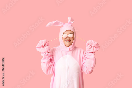 Funny senior woman in bunny...