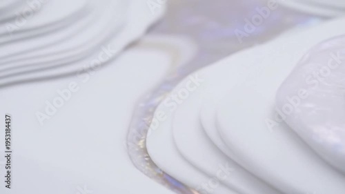 White Liquid Flow Smooth Motion Iridescent Shine Closeup