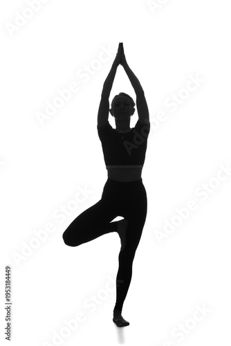 Silhouette of young woman p...